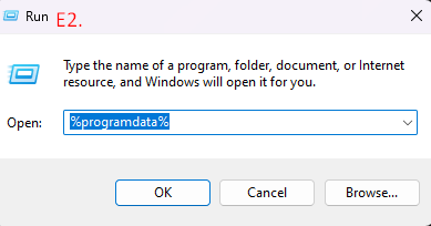 Windows Run dialog with "%programdata%" input.