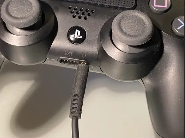 How to connect a headset to your PlayStation 4 via 3.5mm connection Corsair