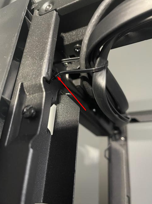 Cable management in a black metal frame.